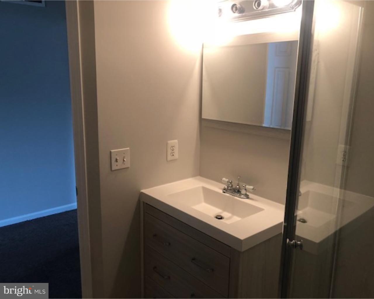4 Sage Drive Lumberton, NJ 08048 - Photo 16 of 24 a bathroom with a sink and a mirror