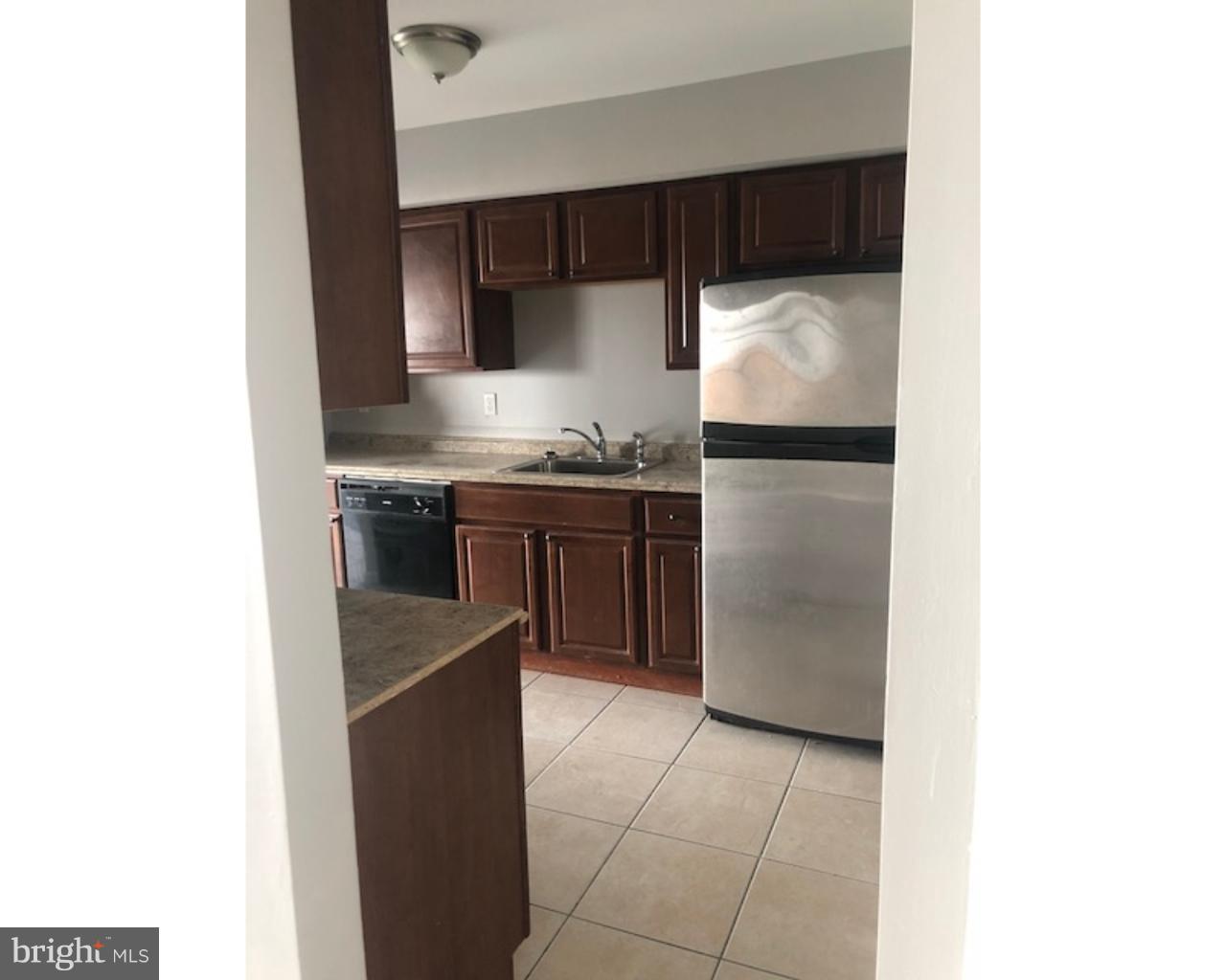 4 Sage Drive Lumberton, NJ 08048 - Photo 6 of 24 a kitchen with a sink cabinets and stainless steel appliances