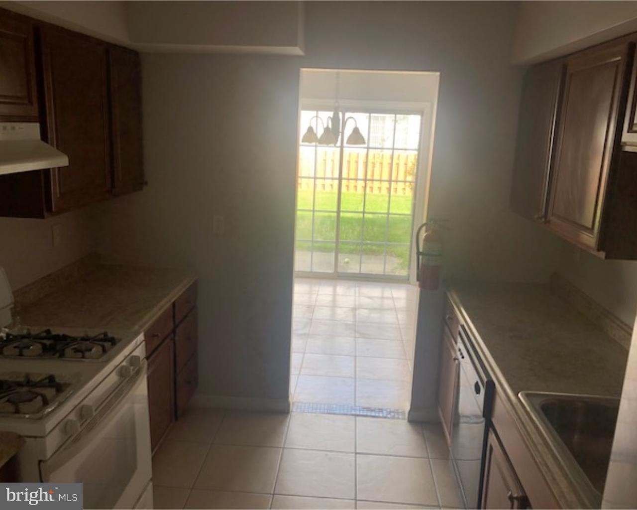 4 Sage Drive Lumberton, NJ 08048 - Photo 7 of 24 a kitchen with a stove