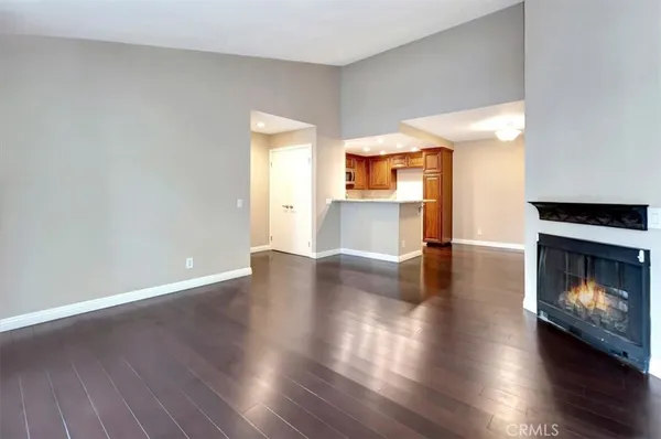 a view of a livingroom with furniture and a fireplace