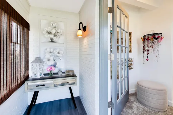a kitchen with stainless steel appliances wooden cabinets and a stove top oven
