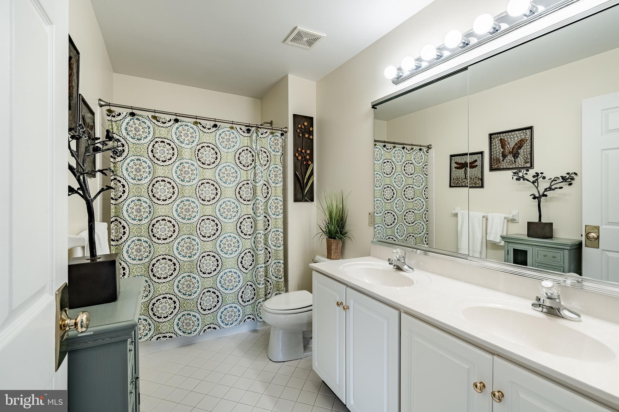 5 Country Run Thornton, PA 19373 - Photo 29 of 50 a spacious bathroom with a toilet sink and shower