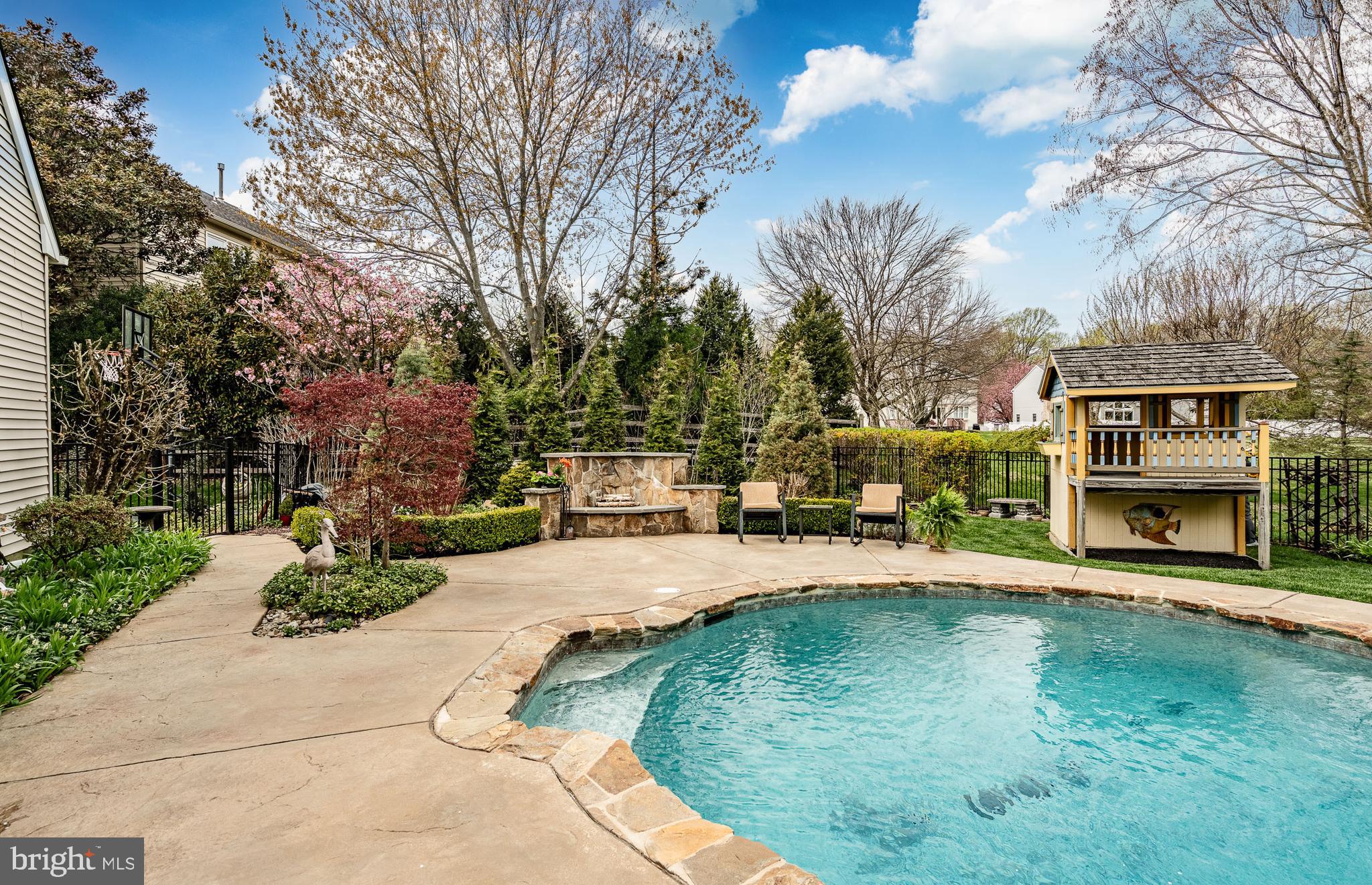 5 Country Run Thornton, PA 19373 - Photo 37 of 50 a swimming pool with outdoor seating and yard
