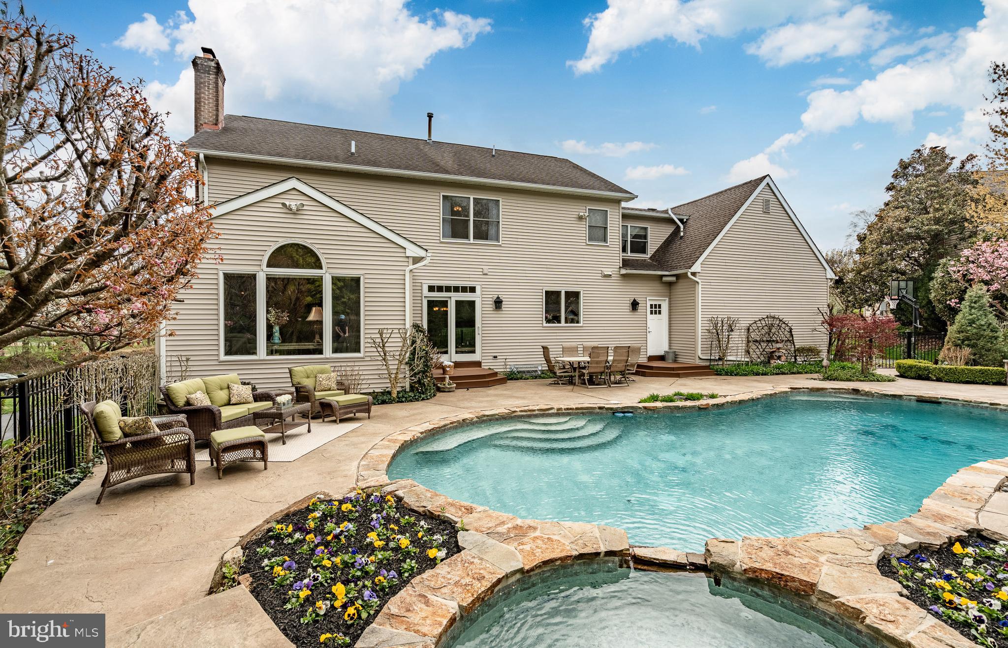 5 Country Run Thornton, PA 19373 - Photo 43 of 50 a view of a house with swimming pool and sitting area