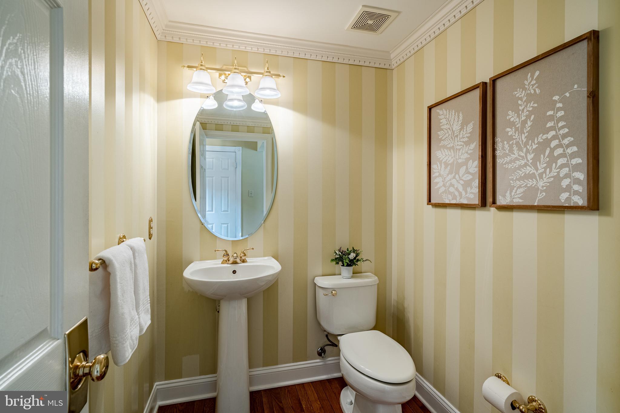 5 Country Run Thornton, PA 19373 - Photo 7 of 50 a bathroom with a toilet a sink and a mirror