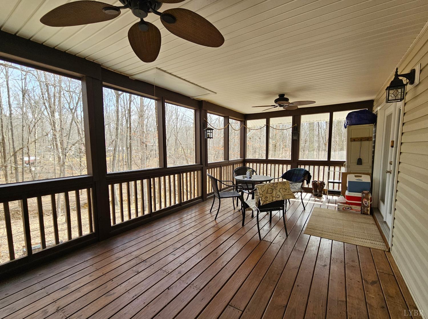 3190 Five Forks Road Pamplin, VA 23958 - Photo 8 of 31 a living room with wooden floor furniture and a large window