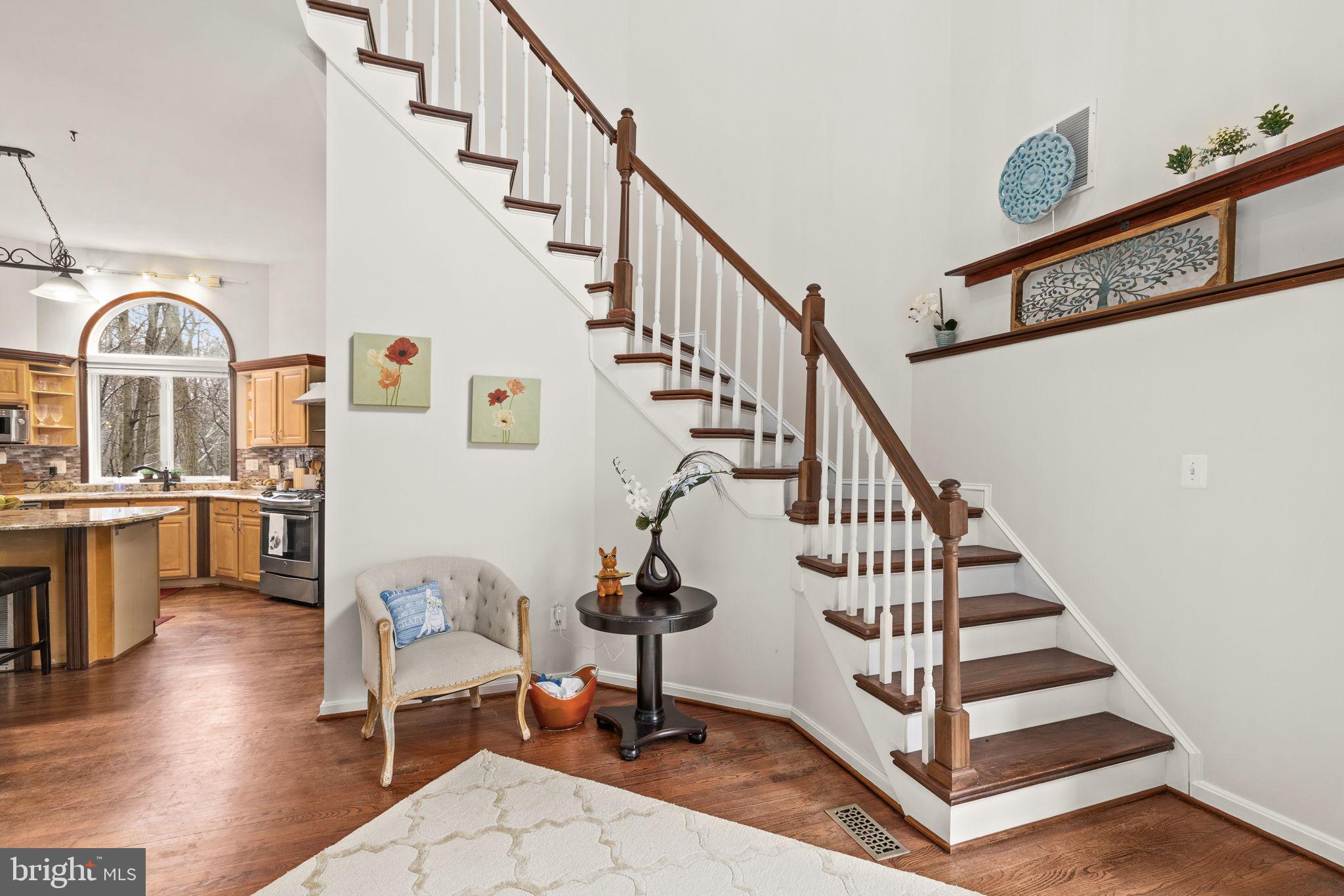 8701 Sinclair Mill Road Manassas, VA 20112 - Photo 11 of 130 2 story entry way with winding staircase