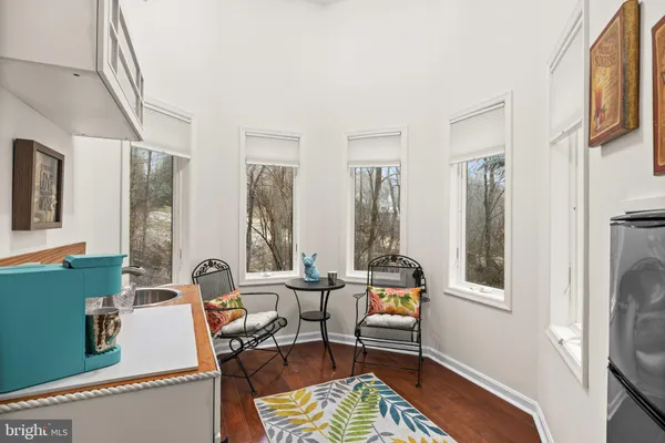 a view of a backyard with chairs
