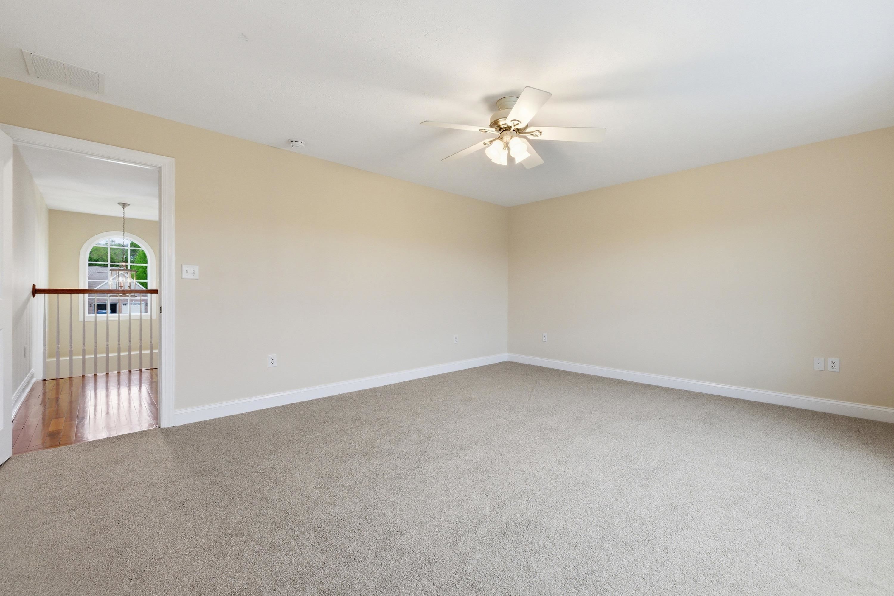 2625 Rising Rock Court Harrisonburg, VA 22802 - Photo 27 of 73 The primary bedroom is located on the upper level of the home and offers comfortable flooring throughout, ceiling fan, large windows, and spacious walk-in closet.
