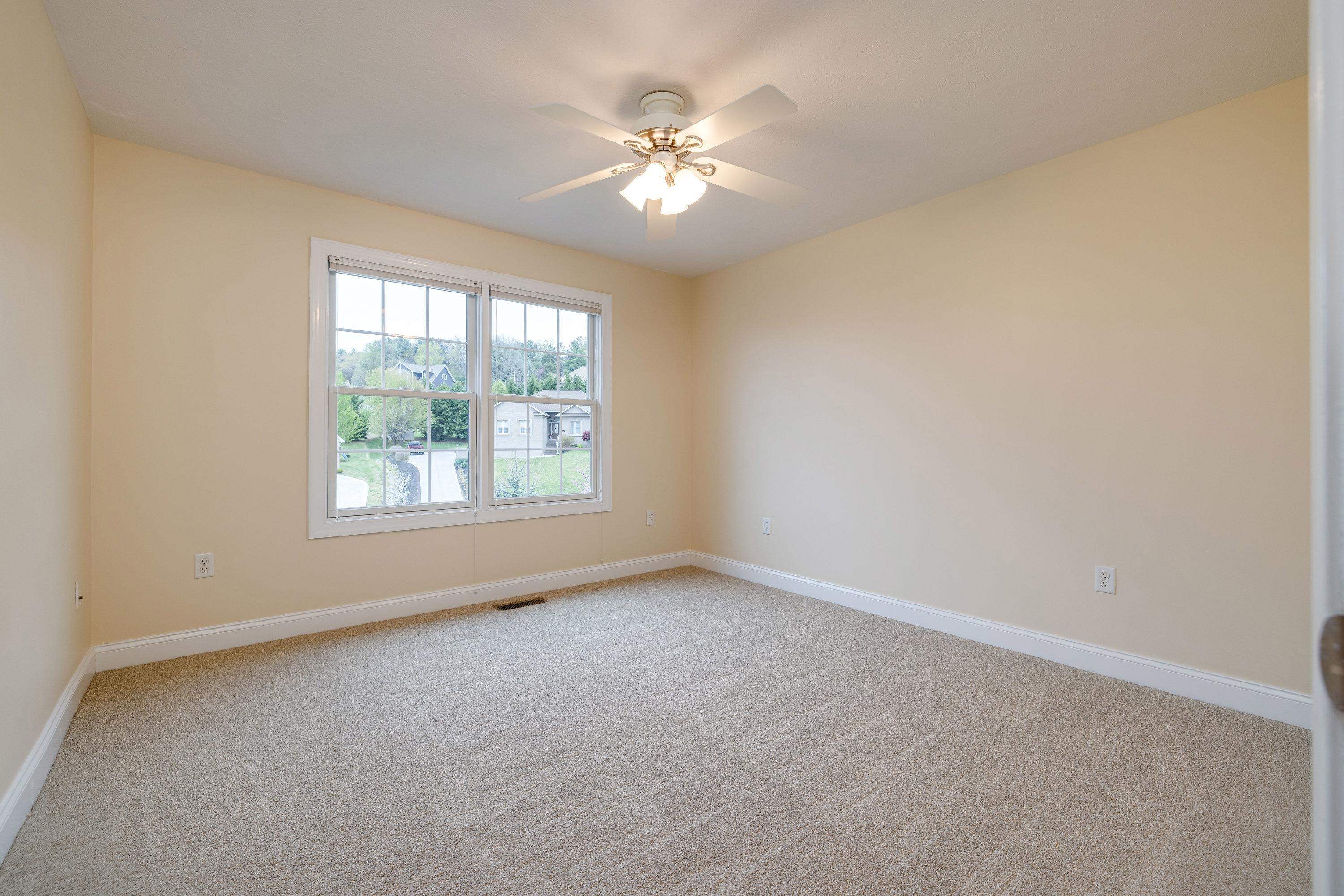 2625 Rising Rock Court Harrisonburg, VA 22802 - Photo 36 of 73 An additional bedroom on the upper level of the home, this bedroom features comfortable flooring throughout and a spacious closet with shelving!