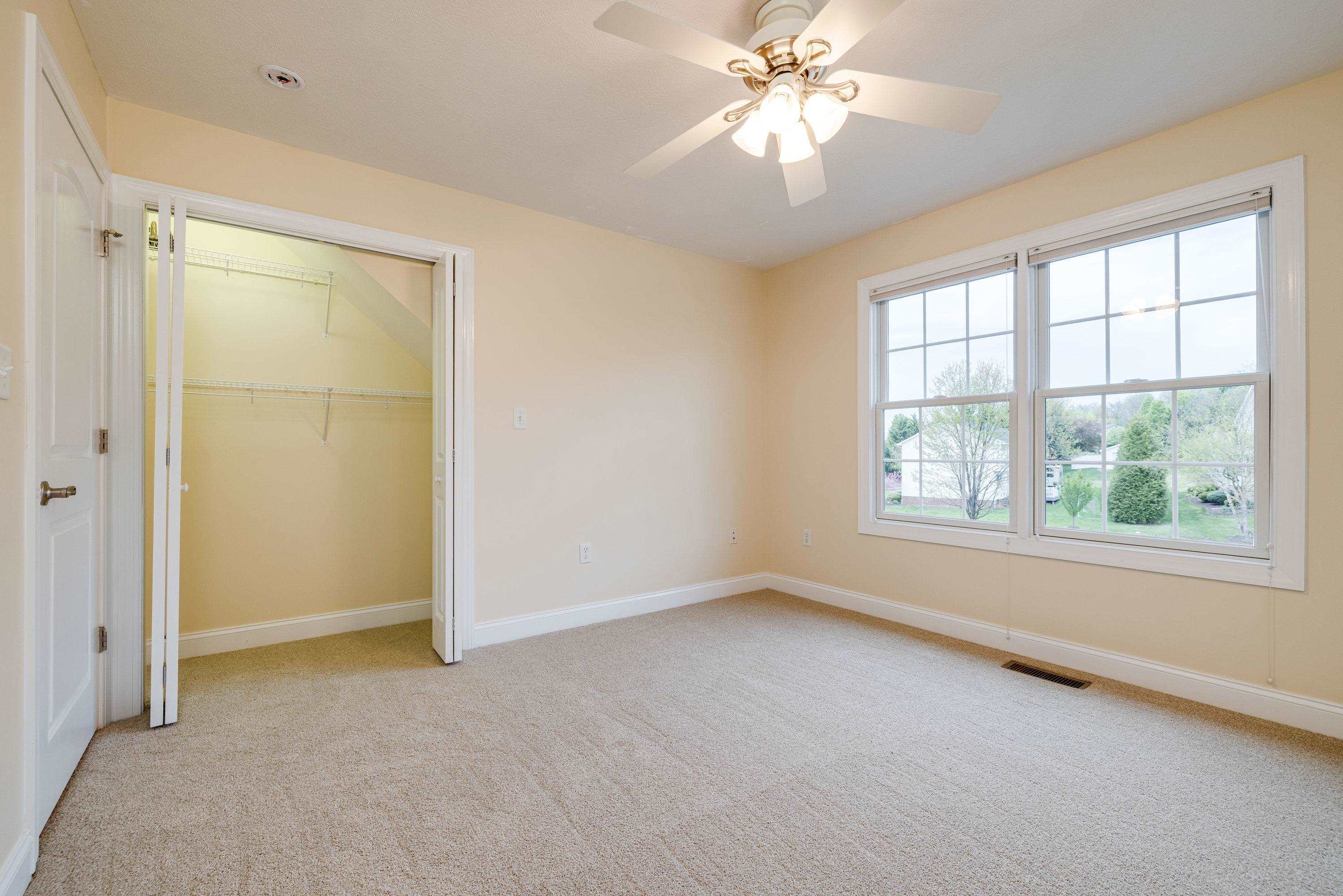 2625 Rising Rock Court Harrisonburg, VA 22802 - Photo 37 of 73 An additional bedroom on the upper level of the home, this bedroom features comfortable flooring throughout and a spacious closet with shelving!