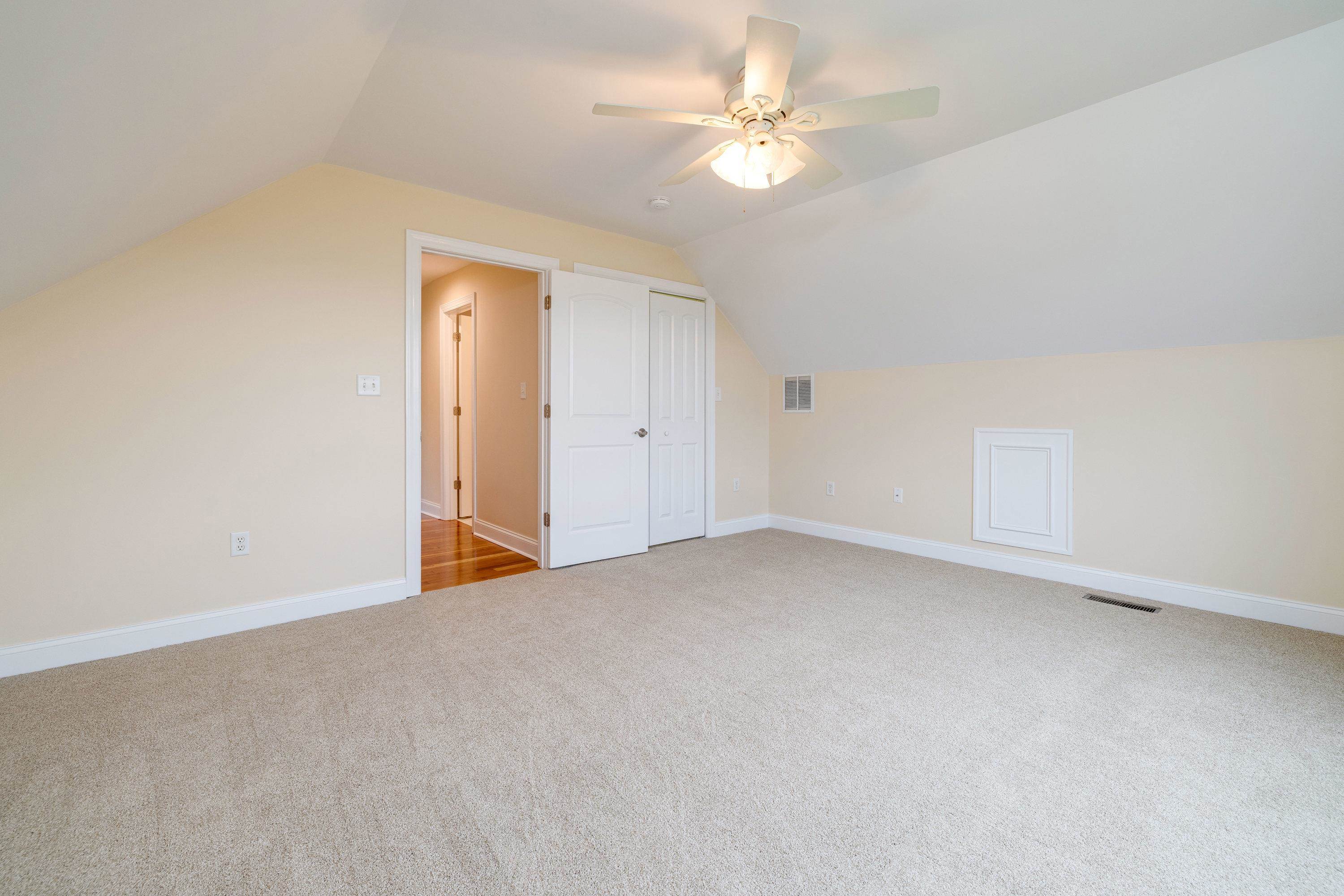 2625 Rising Rock Court Harrisonburg, VA 22802 - Photo 40 of 73 A very spacious bedroom is lcoated on the upper level over the garage space! This large bedroom features comfortable flooring throughout, ceiling fan, large closet, and more!
