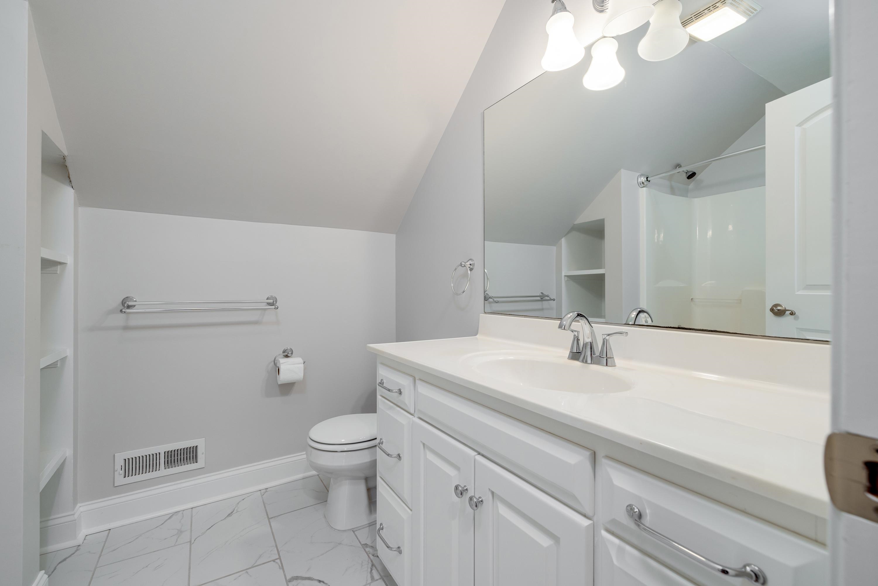 2625 Rising Rock Court Harrisonburg, VA 22802 - Photo 42 of 73 This full bathroom features a full bathtub/shower combination. This bedroom offers convenience to the upstairs bedrooms and offers tile flooring and vanity with storage.