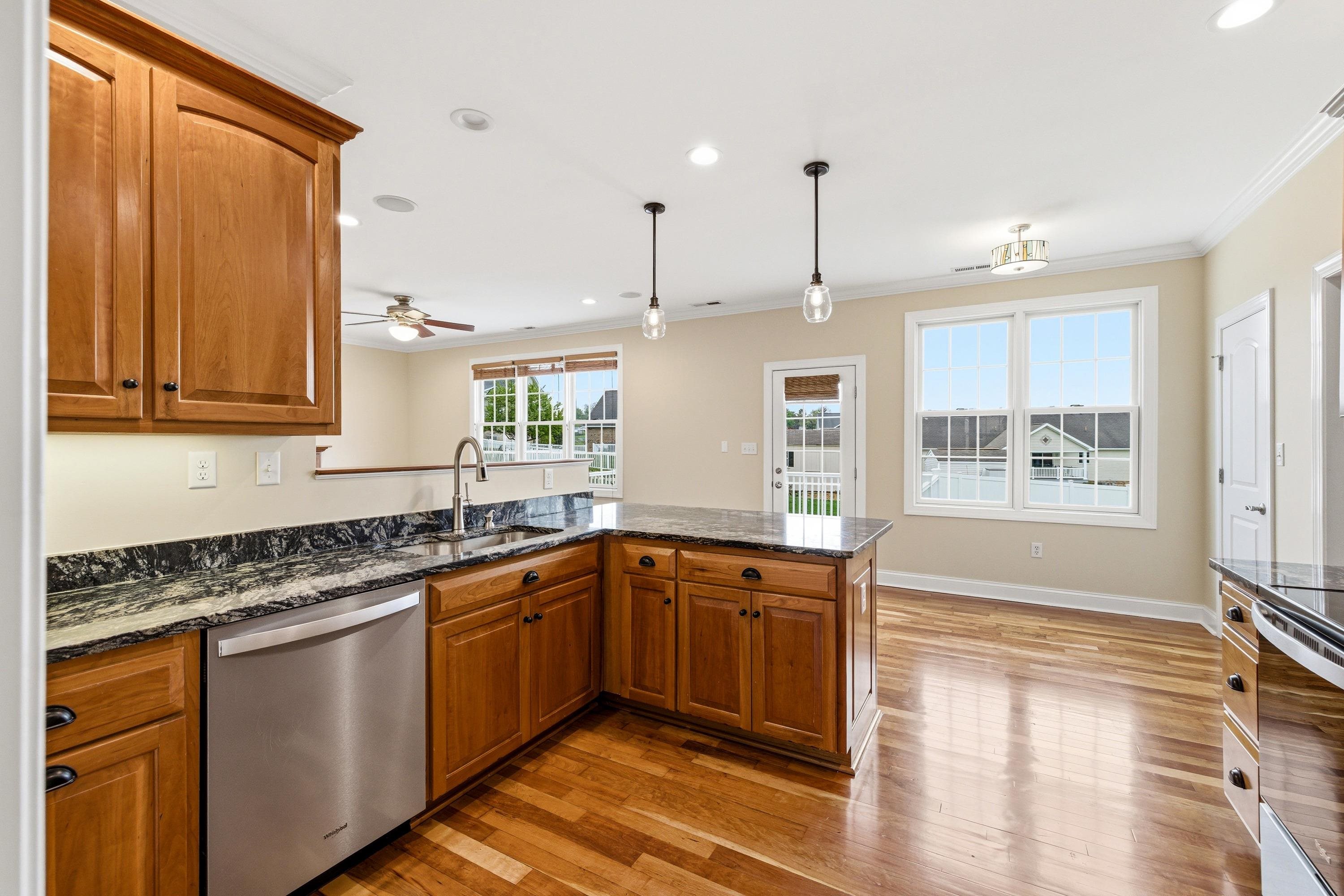 2625 Rising Rock Court Harrisonburg, VA 22802 - Photo 5 of 73 This lovely kitchen features hardwood flooring throughout, stainless steel appliances, recessed lighting, granite counter-tops, breakfast bar, and much more!