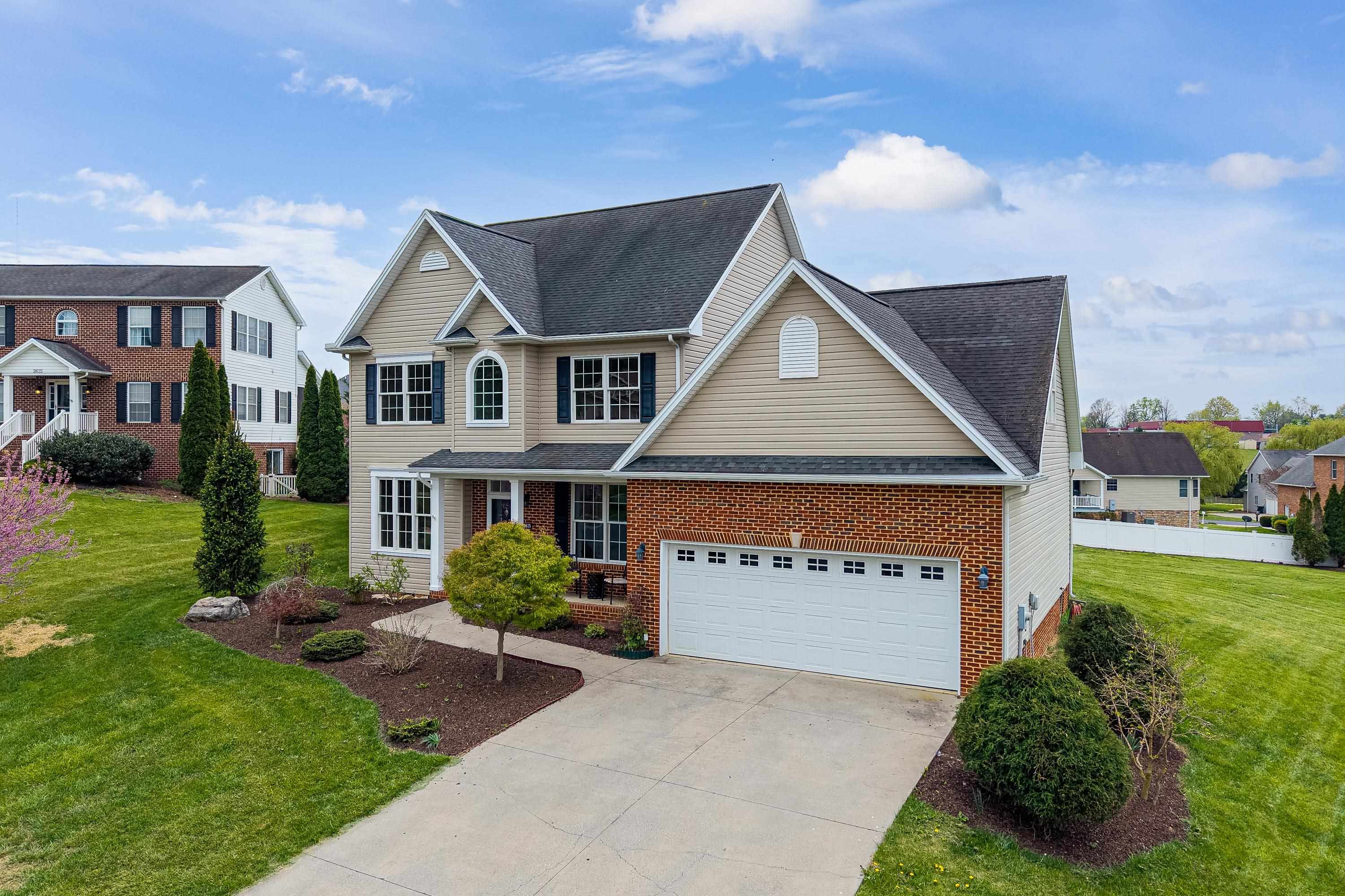 2625 Rising Rock Court Harrisonburg, VA 22802 - Photo 51 of 73 The front view of this lovely, two-story home, features a concrete driveway, cul-de-sac location, front porch, two car garage, and mature landscaping!