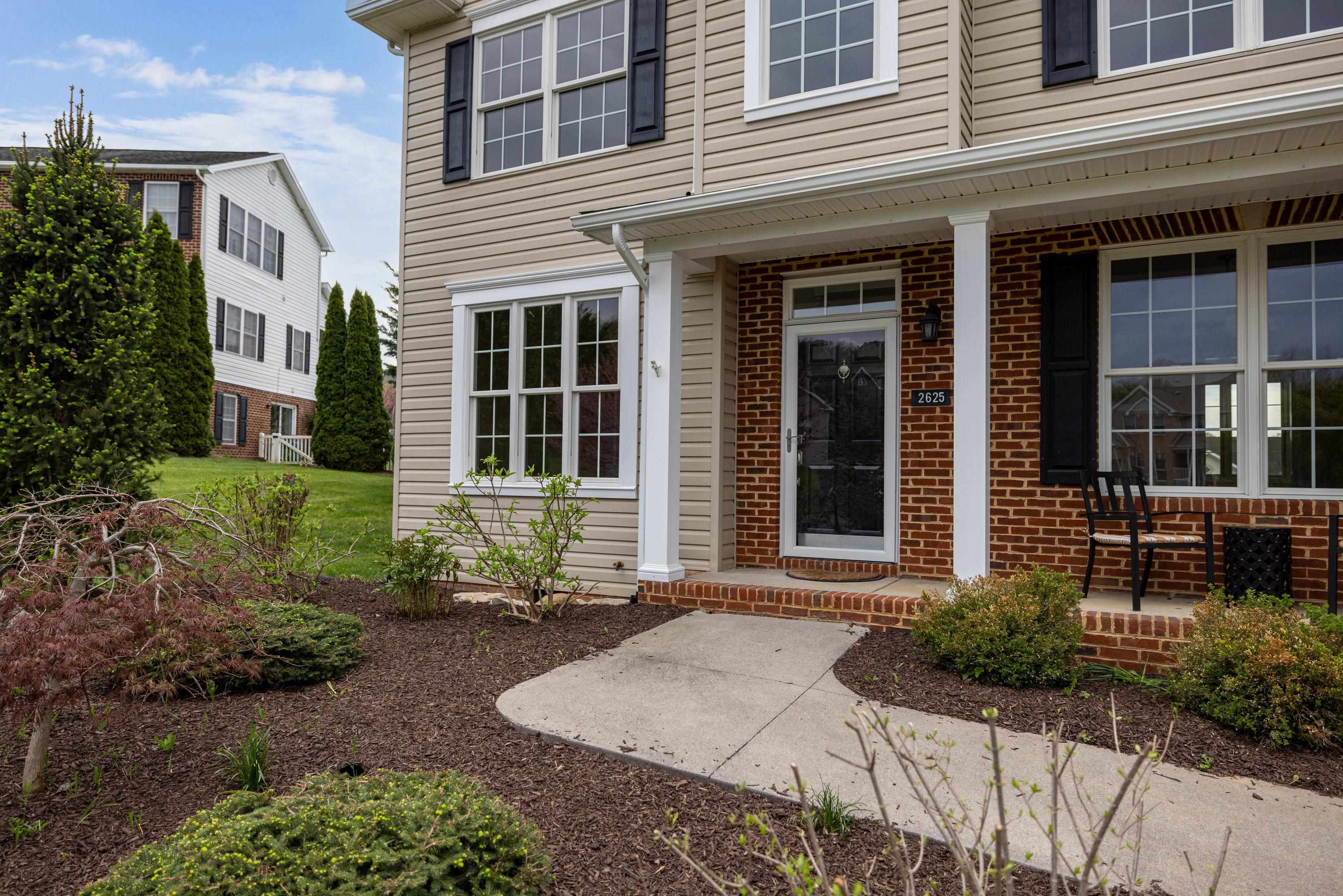2625 Rising Rock Court Harrisonburg, VA 22802 - Photo 53 of 73 The front view of this lovely, two-story home, features a concrete driveway, cul-de-sac location, front porch, two car garage, and mature landscaping!