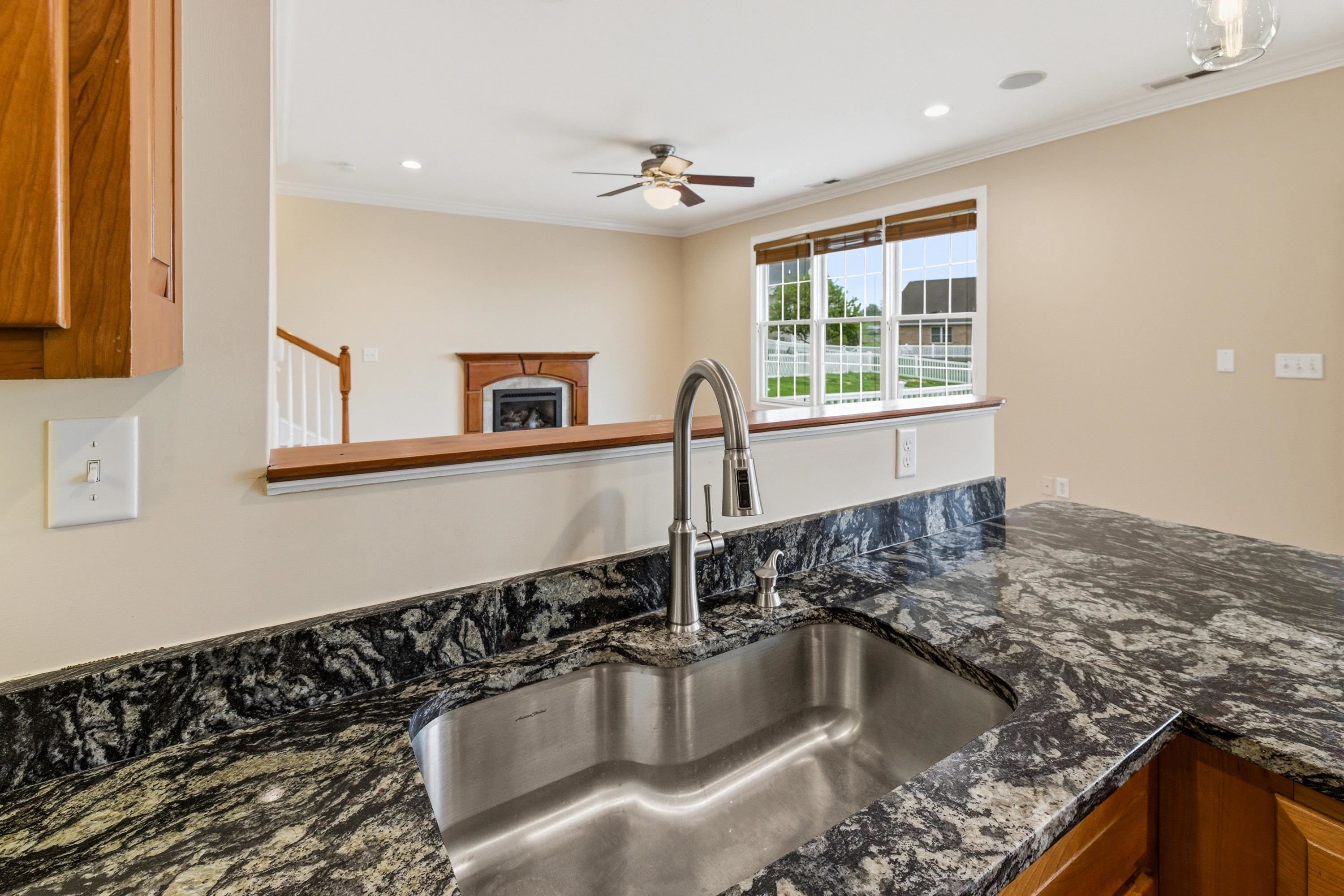 2625 Rising Rock Court Harrisonburg, VA 22802 - Photo 7 of 73 This lovely kitchen features hardwood flooring throughout, stainless steel appliances, recessed lighting, granite counter-tops, breakfast bar, and much more!