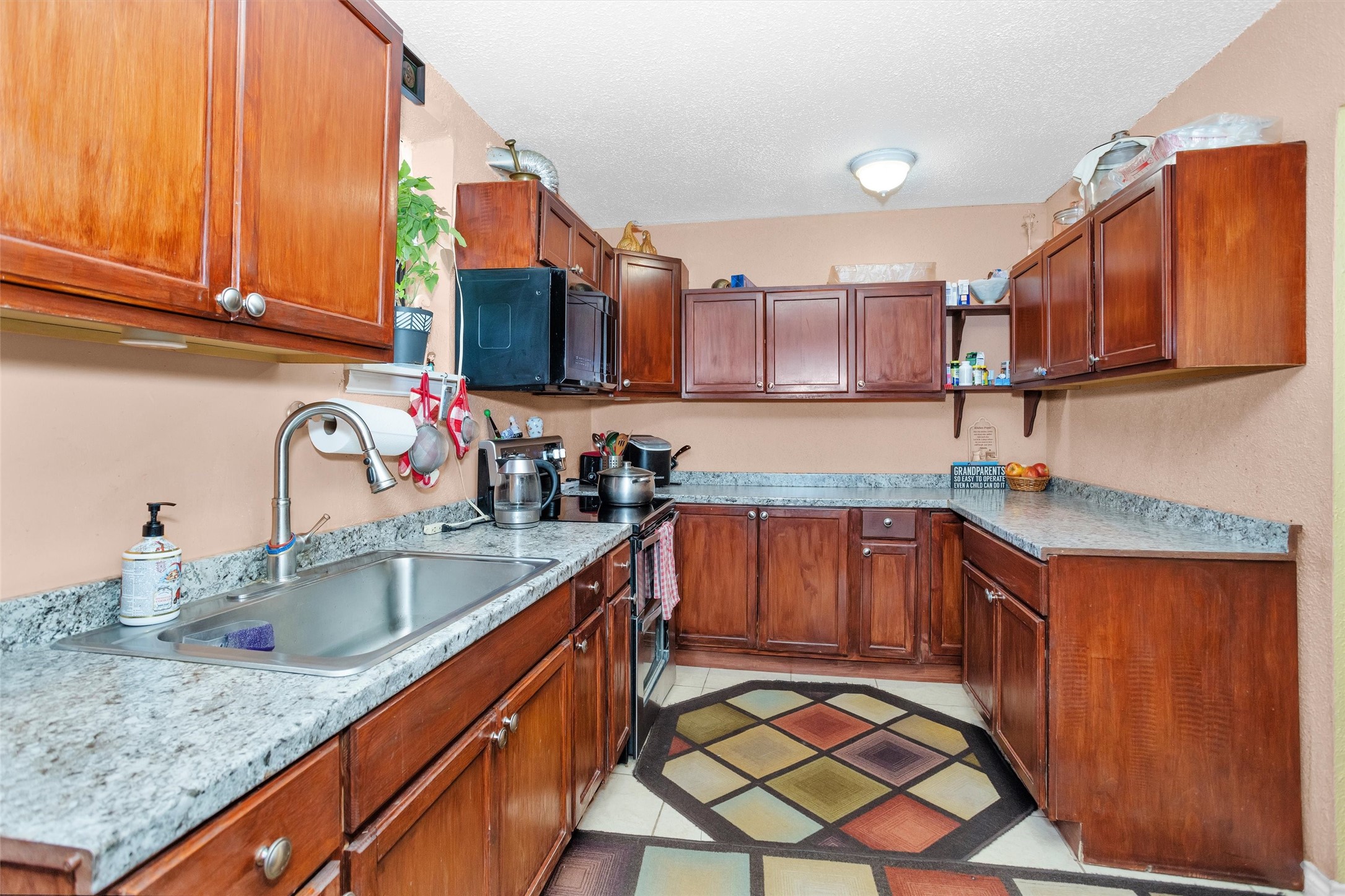 30806 Mellman Road Hempstead, TX 77445 - Photo 31 of 35 This a really spacious kitchen with lots of counter space and cabinets.
