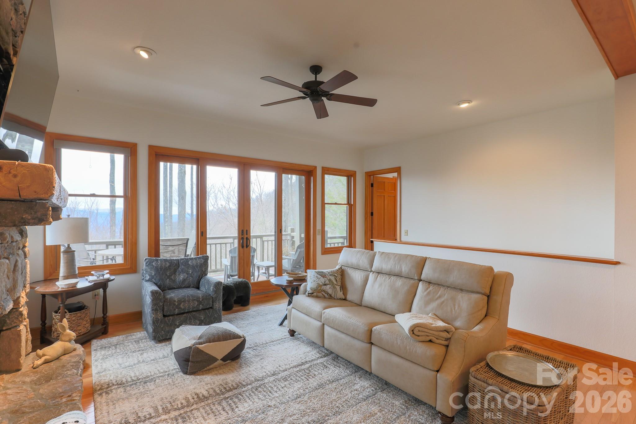 528 Andrew Banks Road, Unit A/3 Burnsville, NC 28714 - Photo 6 of 30 a living room with furniture and a large window