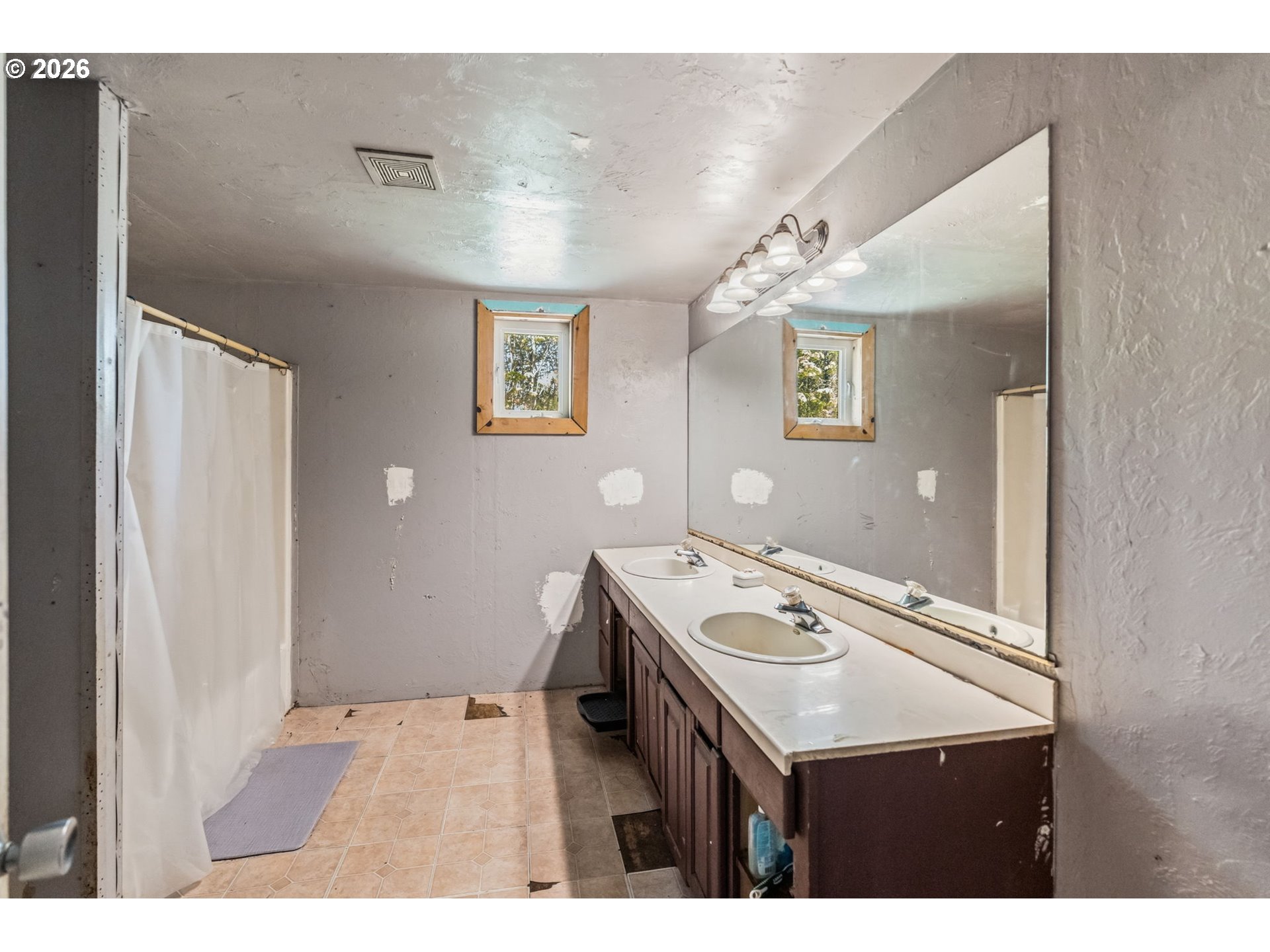21542 Highway 126 Noti, OR 97461 - Photo 15 of 22 a bathroom with a sink and a mirror