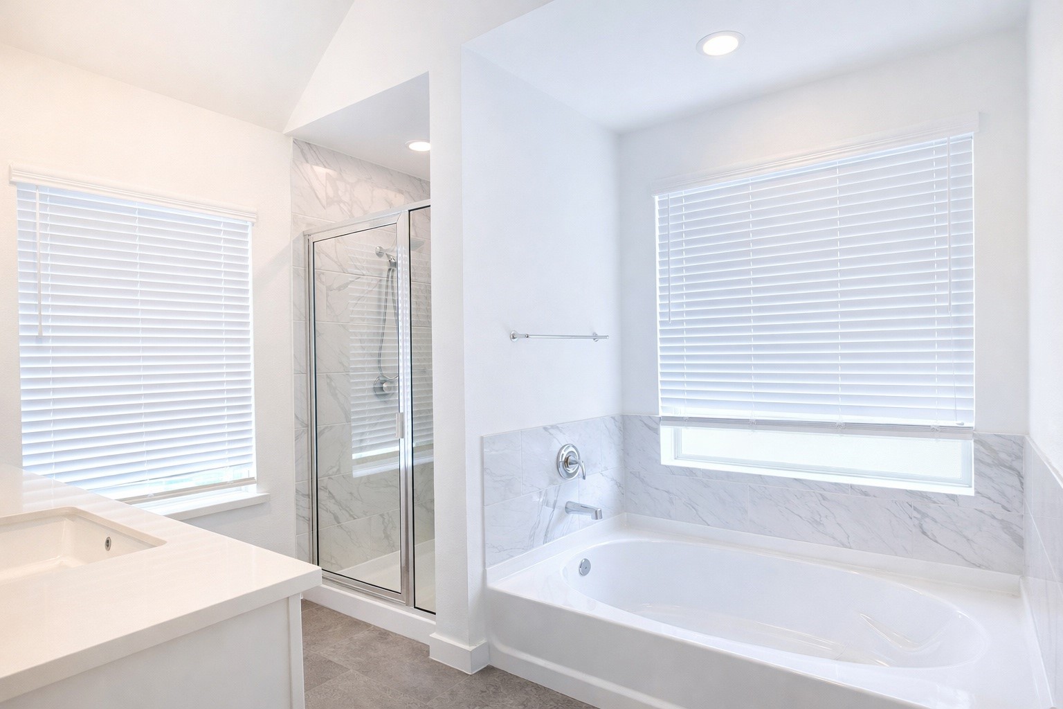 15907 Golden Trails Conroe, TX 77302 - Photo 13 of 17 a bathroom with a bathtub and a shower