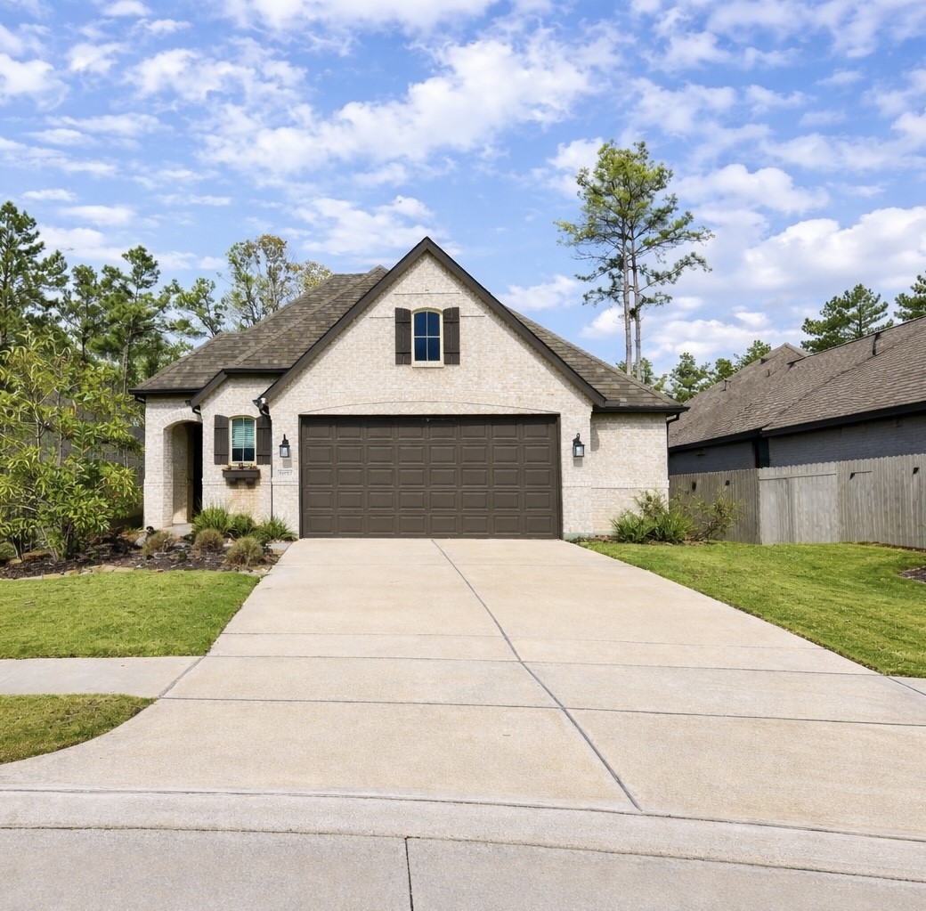 15907 Golden Trails Conroe, TX 77302 - Photo 6 of 17 a front view of house with yard and trees