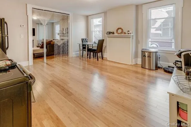 a view of a living room and dining room