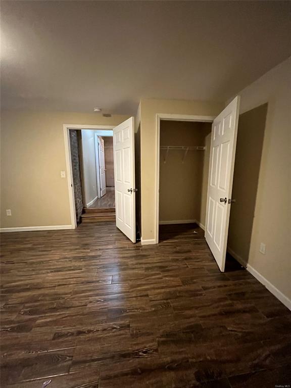 9 Clinton Street Poughkeepsie, NY 12601 - Photo 36 of 46 an empty room with wooden floor and entrance