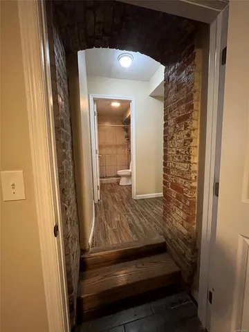 a view of a pathway with a backyard