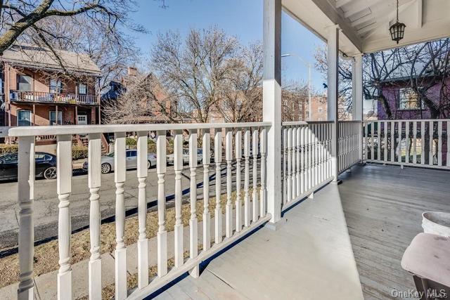 9 Clinton Street Poughkeepsie, NY 12601 - Photo 4 of 46 a view of a balcony with wooden fence