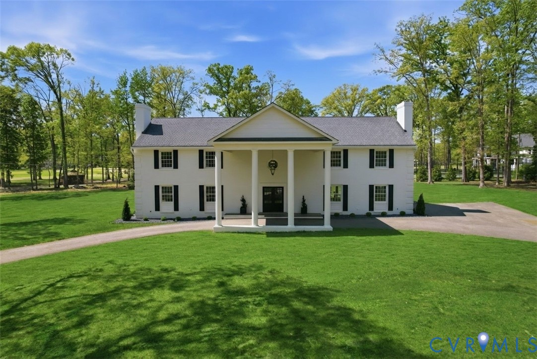 2540 Kentford Road Midlothian, VA 23113 - Photo 2 of 47 a front view of a house with a yard
