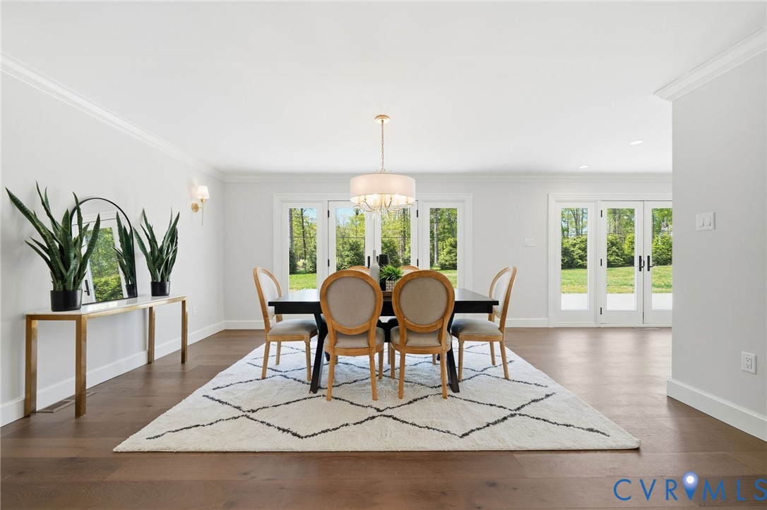 2540 Kentford Road Midlothian, VA 23113 - Photo 21 of 47 a view of a dining room with furniture window and wooden floor