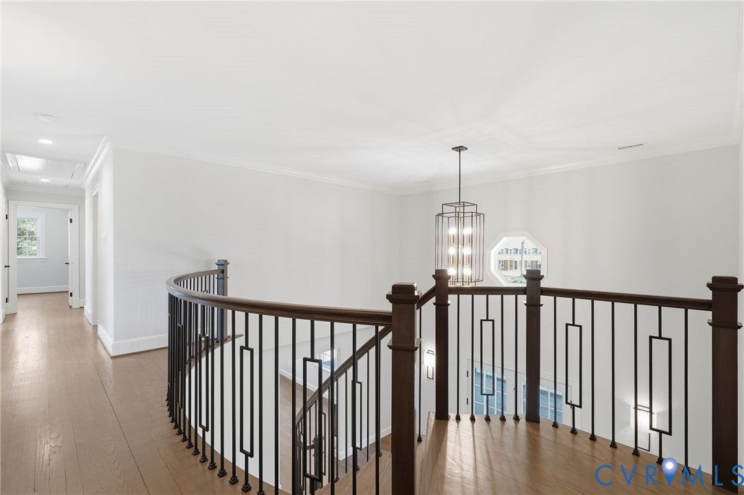 2540 Kentford Road Midlothian, VA 23113 - Photo 28 of 47 a view of a hallway with wooden floor and windows