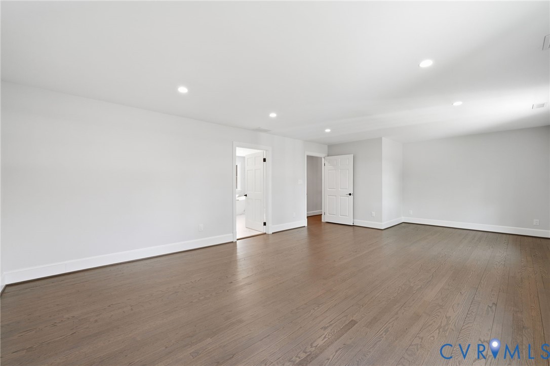 2540 Kentford Road Midlothian, VA 23113 - Photo 30 of 47 an empty room with wooden floor and windows