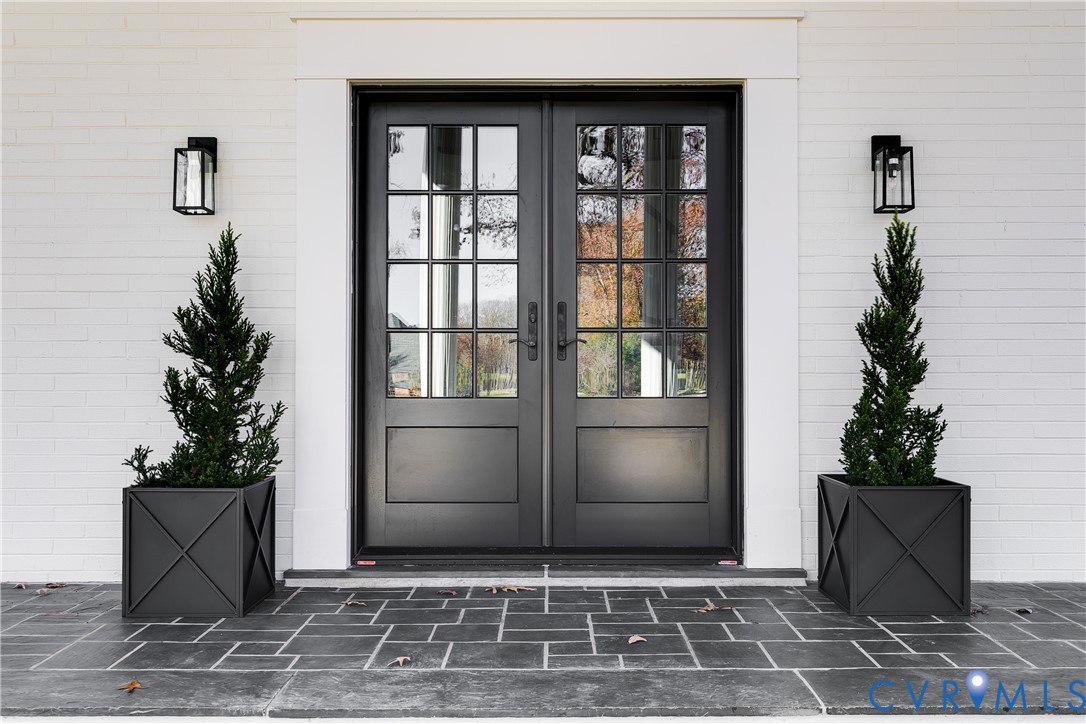 2540 Kentford Road Midlothian, VA 23113 - Photo 5 of 47 a view of a door and a potted plant