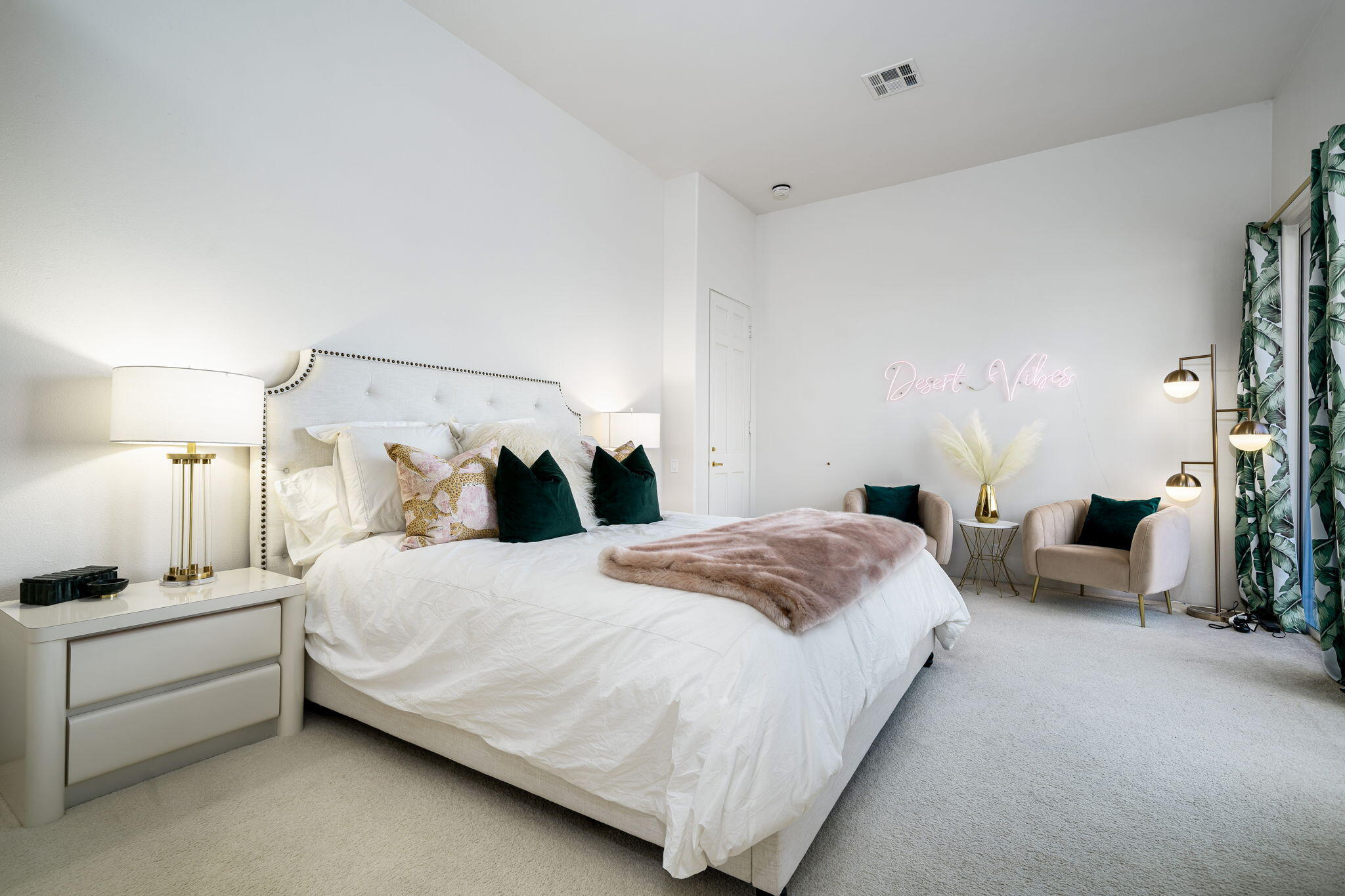 75720 Vista Del Rey Indian Wells, CA 92210 - Photo 21 of 31 a bedroom with a bed and a view of en suite bathroom