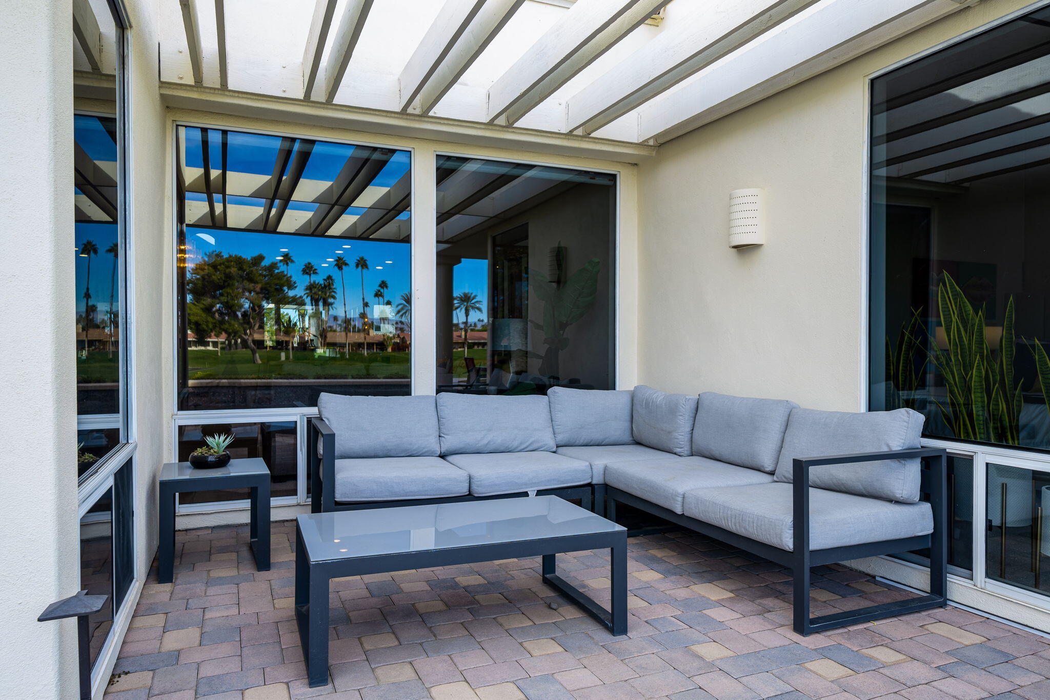 75720 Vista Del Rey Indian Wells, CA 92210 - Photo 29 of 31 a living room with furniture and a large window