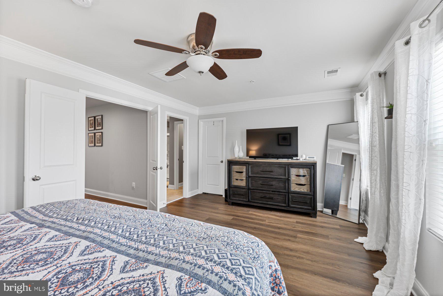 1205 Orchid Road Gambrills, MD 21054 - Photo 23 of 46 Owner's Bedroom w/ Crown Molding & Ceiling Fan