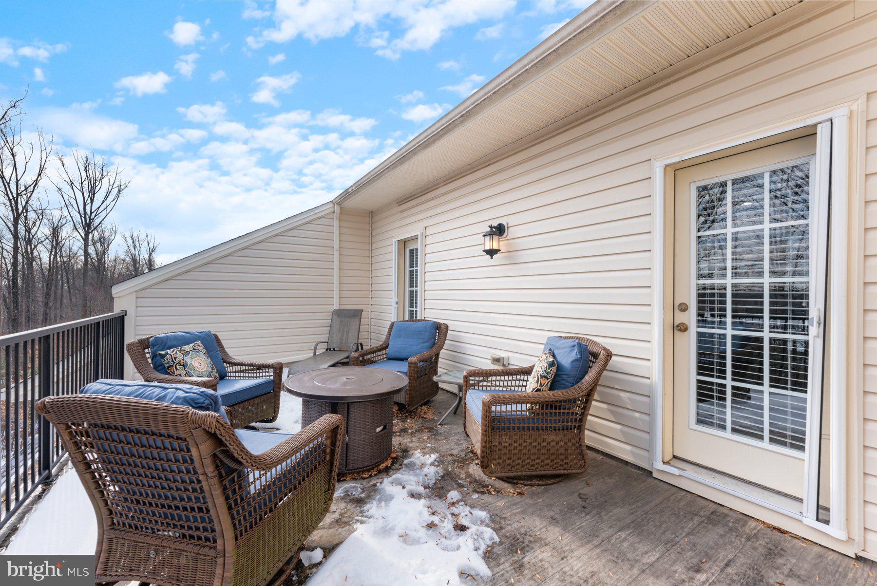 1205 Orchid Road Gambrills, MD 21054 - Photo 38 of 46 4th Level Deck (furniture & firepit convey)
