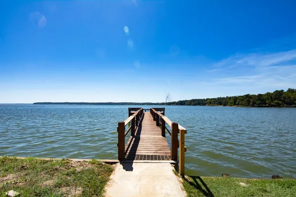 a view of wooden floor with a lake