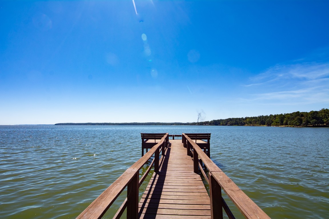 150 Edgewater Way Point Blank, TX 77364 - Photo 44 of 48 a view of wooden floor with a lake