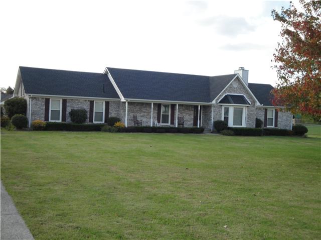 4111 Meadow View Circle Pleasant View, TN 37146 - Photo 1 of 16 a front view of a house with a garden