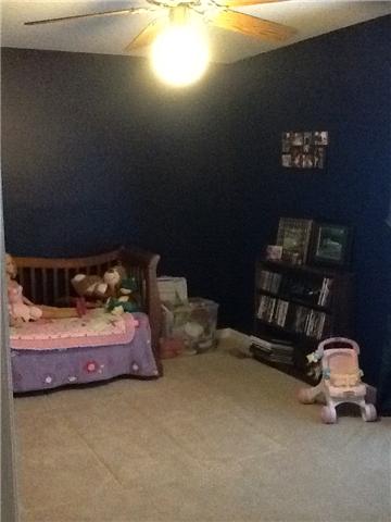 4111 Meadow View Circle Pleasant View, TN 37146 - Photo 12 of 16 a bedroom with bed and window