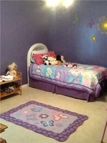 4111 Meadow View Circle Pleasant View, TN 37146 - Photo 13 of 16 a bedroom with a bed