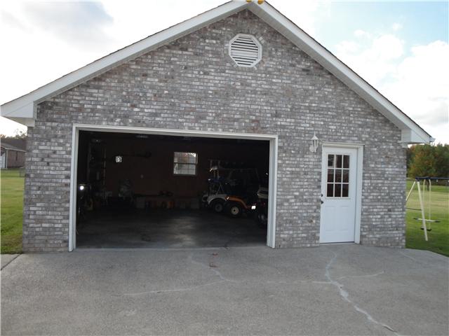 4111 Meadow View Circle Pleasant View, TN 37146 - Photo 16 of 16 a front view of a house with garage
