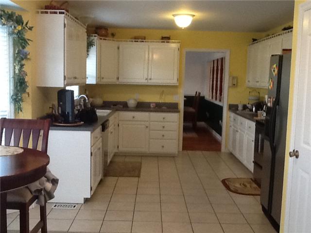 4111 Meadow View Circle Pleasant View, TN 37146 - Photo 8 of 16 a kitchen with a cabinets and appliances