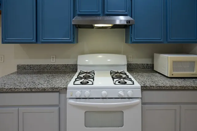 a view of an empty room with glass door