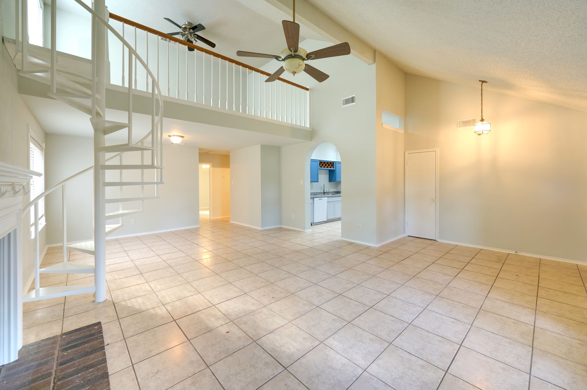 5838 North Magazine Circle Houston, TX 77084 - Photo 24 of 30 a view of a hallway with a chandelier