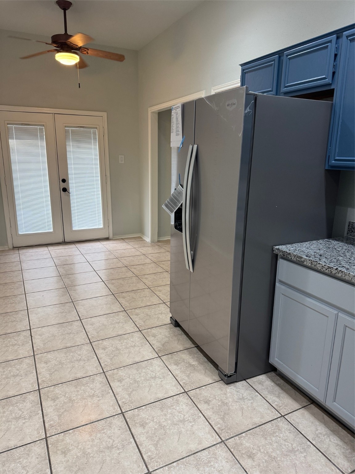 5838 North Magazine Circle Houston, TX 77084 - Photo 29 of 30 a kitchen with a refrigerator and a stove