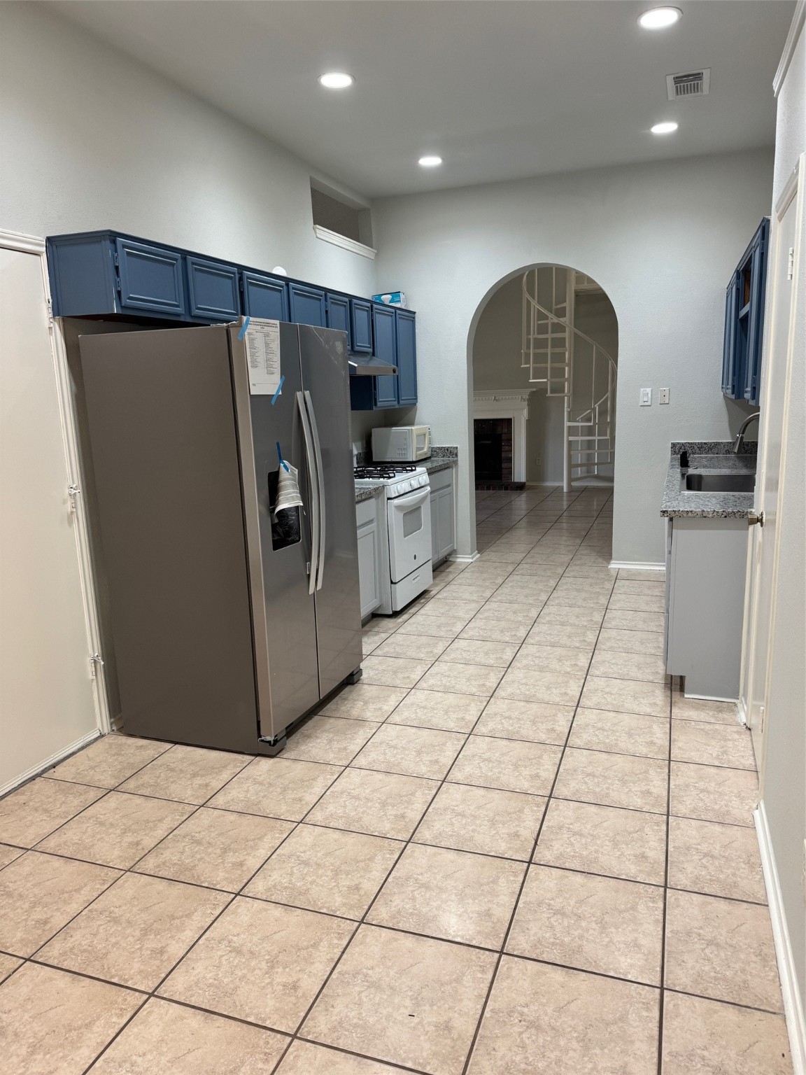 5838 North Magazine Circle Houston, TX 77084 - Photo 30 of 30 a kitchen with stainless steel appliances granite countertop a refrigerator and a sink